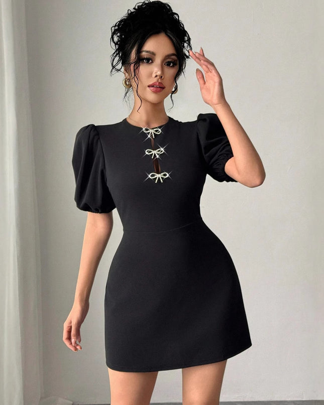 Europäische und amerikanische Damen Kleid mit Rundhalsausschnitt, hohlen Kristall-Puffärmeln und taillierter Passform