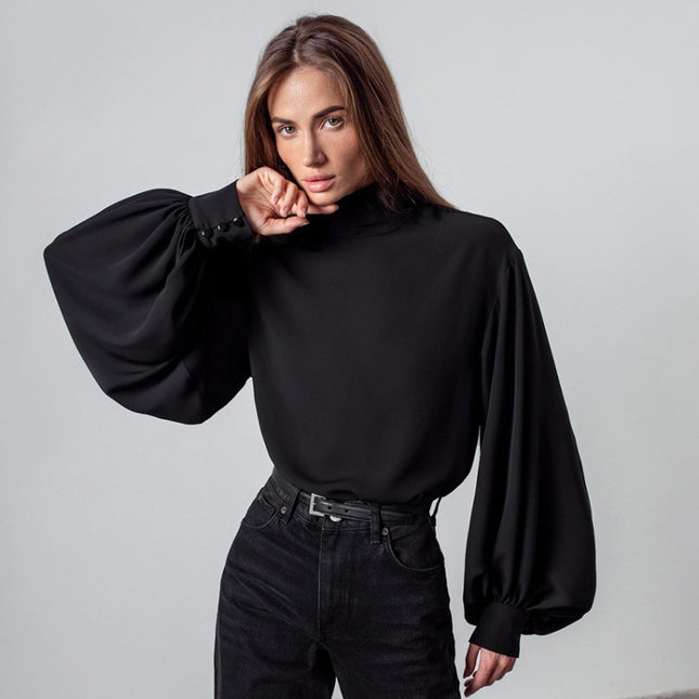 Elegante hochtaillierte Bluse mit Laternenärmeln