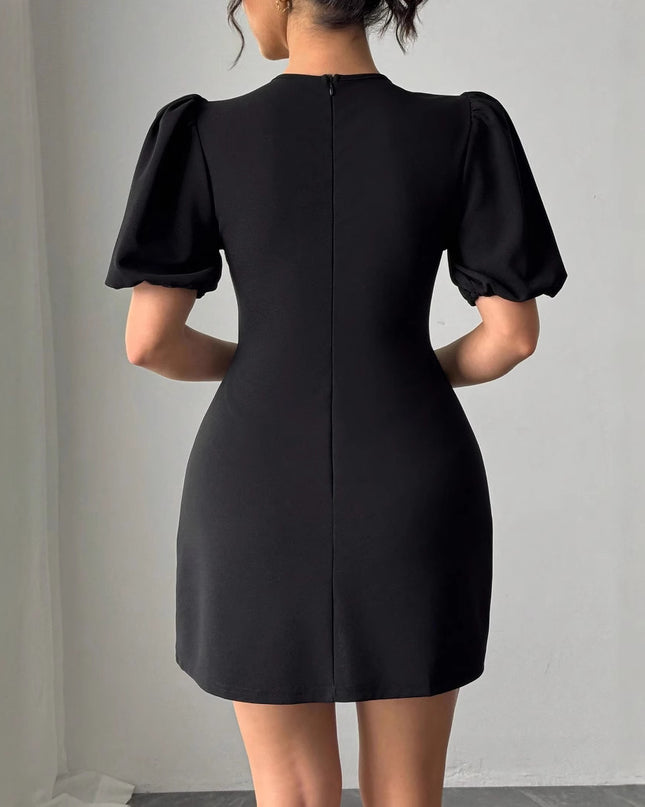 Europäische und amerikanische Damen Kleid mit Rundhalsausschnitt, hohlen Kristall-Puffärmeln und taillierter Passform
