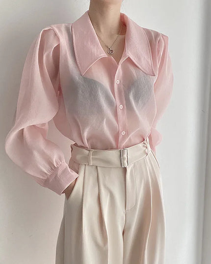 Stylische rosa Bluse mit transparenten Details und Puffärmeln für Damen