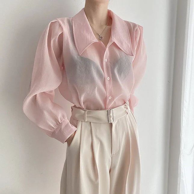 Stylische rosa Bluse mit transparenten Details und Puffärmeln für Damen